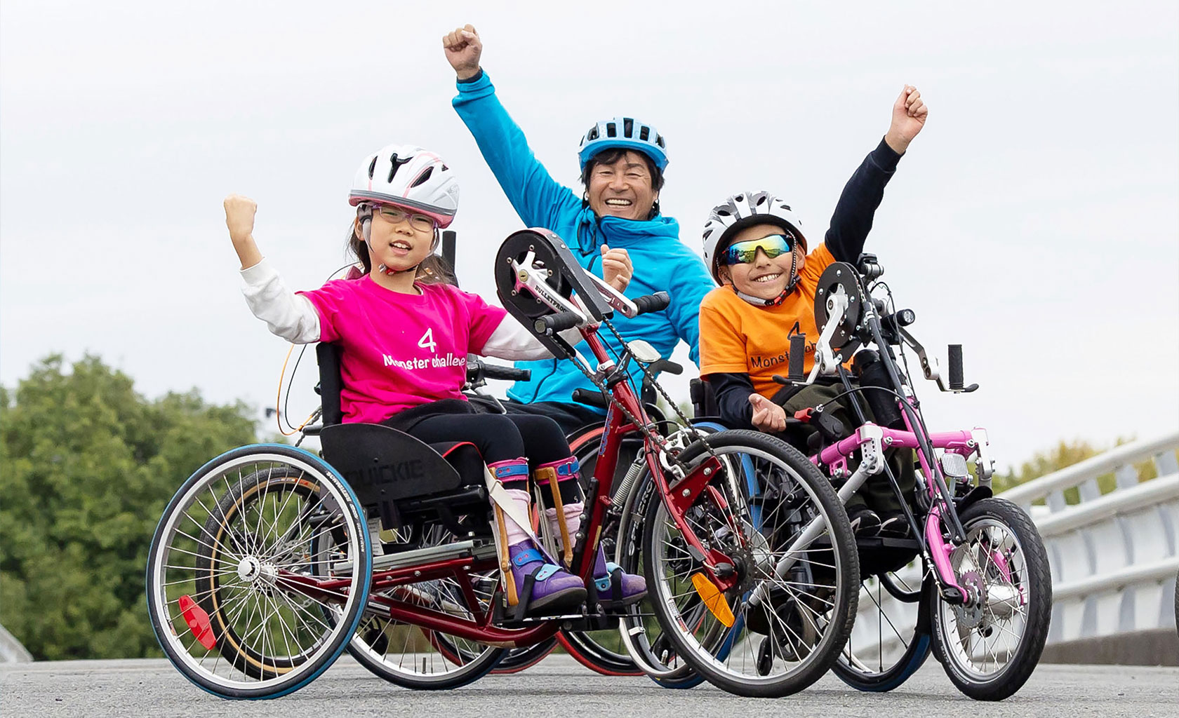 children enjoying a hand cycle